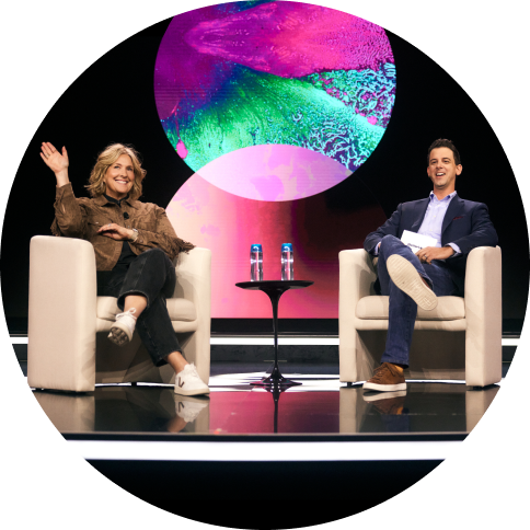 Brene and Alexi on stage at Uplift